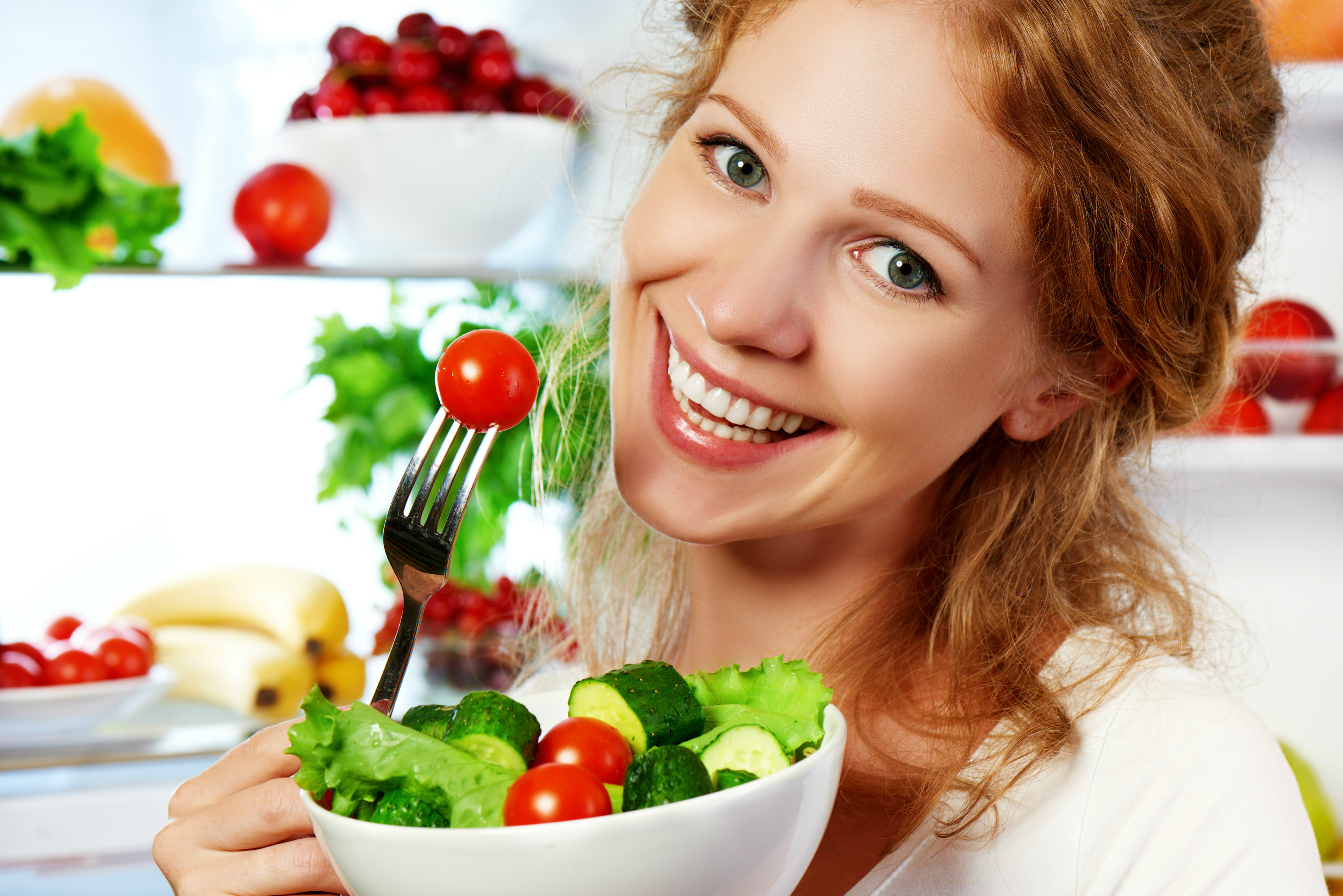 girl with a plate of salad